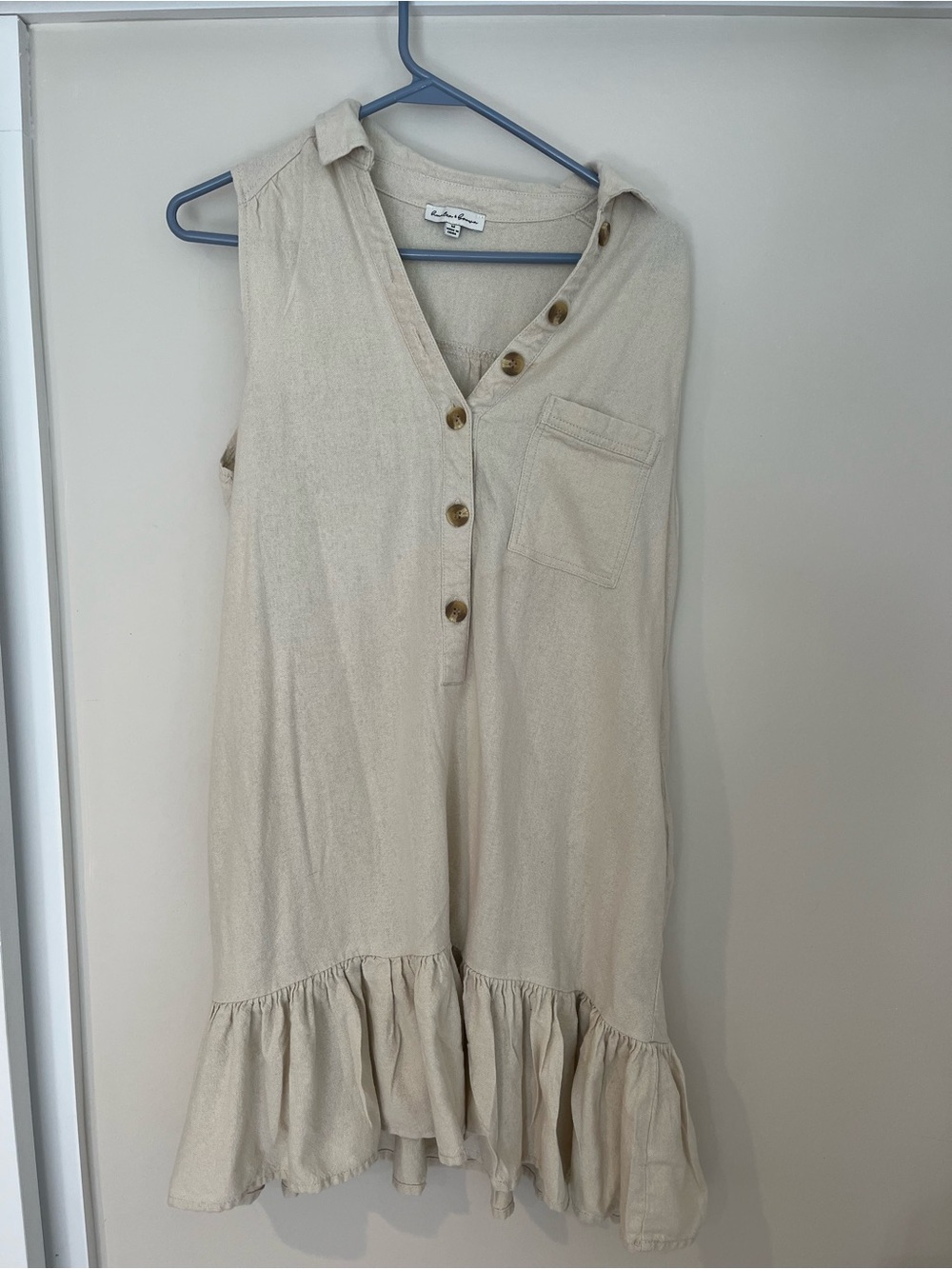 Sleeveless Cream Ruffle-Hem Mini Dress